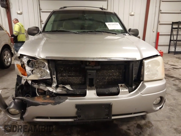 2005 GMC Envoy SLE with VIN 1GKET16S656102522, listed as a IAAI auction lot 41729310 with 233,049 mi miles. Bid and sale history available at carsss.com. Image 13.