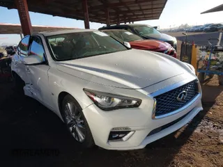 2019 Infiniti Q50 3.0t LUXE with VIN JN1EV7AP1KM515602, listed as a IAAI auction lot 41525562 with 129,666 mi miles. Bid and sale history available at carsss.com. Image 1.