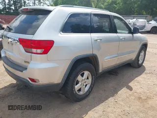 2012 Jeep Grand Cherokee Laredo with VIN 1C4RJEAG4CC251359, listed as a IAAI auction lot 41986762 with 172,331 mi miles. Bid and sale history available at carsss.com. Image 4.