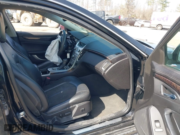 2012 Cadillac CTS Luxury with VIN 1G6DE5E56C0151579, listed as a IAAI auction lot 41717449 with 116,938 mi miles and . Bid and sale history available at DreamBid. Image 5.