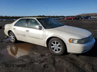 2002 Cadillac Seville Luxury SLS z VIN 1G6KS54Y12U252709, wystawiony jako Copart lot #44379585 z przebiegiem 74 735 mil mil oraz Tytuł czysty. Historia ofert i sprzedaży dostępna na DreamBid. Obrazek 4.