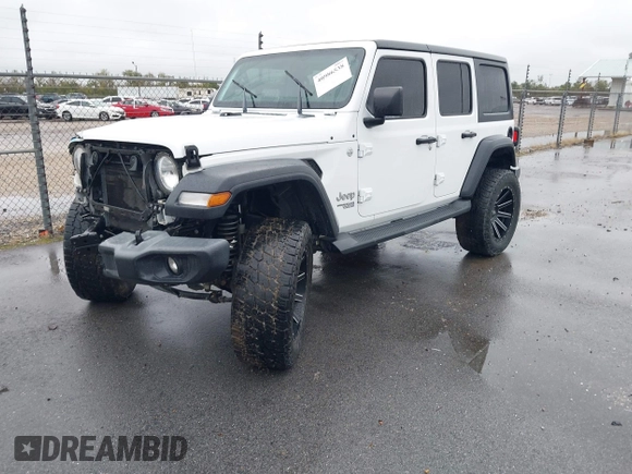 2019 Jeep Wrangler Unlimited Sport Altitude with VIN 1C4HJXDG3KW528647, listed as a IAAI auction lot 40986538 with 85,381 mi miles and . Bid and sale history available at DreamBid. Image 18.