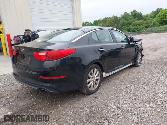 2014 Kia Optima EX z VIN 5XXGN4A77EG330968, wystawiony jako IAAI lot #42209541 z przebiegiem 106 888 mil mil oraz . Historia ofert i sprzedaży dostępna na DreamBid. Obrazek 4.