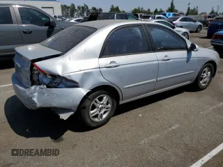 2005 Kia Spectra LX with VIN KNAFE122855179475, listed as a Copart auction lot 66996474 with 187,674 mi miles and Salvage Title. Bid and sale history available at carsss.com. Image 3.