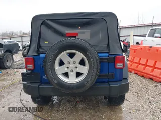 2009 Jeep Wrangler Unlimited X with VIN 1J4GA39189L787777, listed as a IAAI auction lot 41570579 with 193,163 mi miles. Bid and sale history available at carsss.com. Image 16.