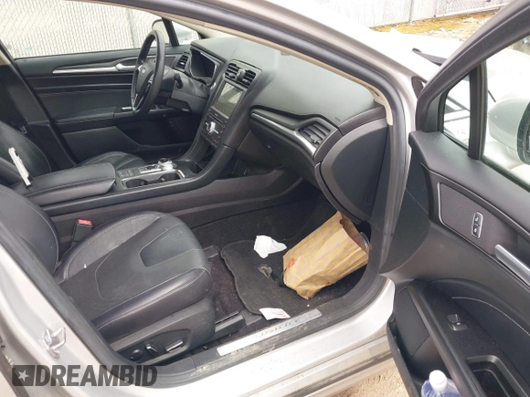 2017 Ford Fusion Titanium with VIN 3FA6P0SU2HR153423, listed as a IAAI auction lot 42029438 with 106,596 mi miles and . Bid and sale history available at DreamBid. Image 5.