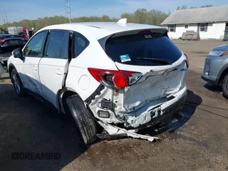 2014 Mazda CX-5 Touring with VIN JM3KE2CY5E0329783, listed as a IAAI auction lot 42017473 with 121,175 mi miles. Bid and sale history available at carsss.com. Image 6.