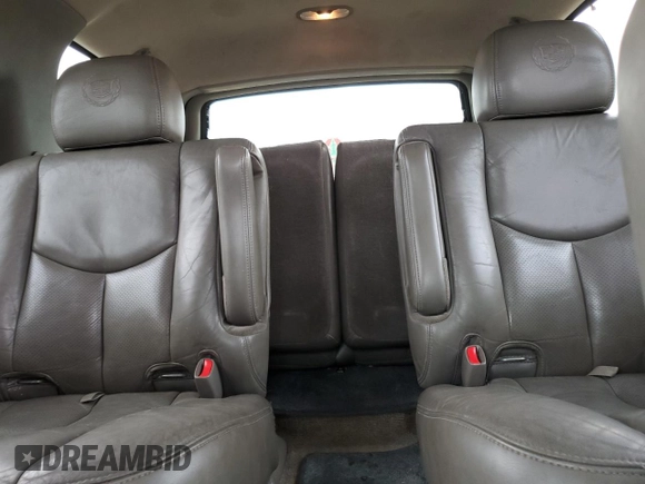 2004 Cadillac Escalade z VIN 1GYEC63T64R260162, wystawiony jako Copart lot #54725685 z przebiegiem 223 615 mil mil oraz Szkoda całkowita • Salvage title. Historia ofert i sprzedaży dostępna na DreamBid. Obrazek 10.