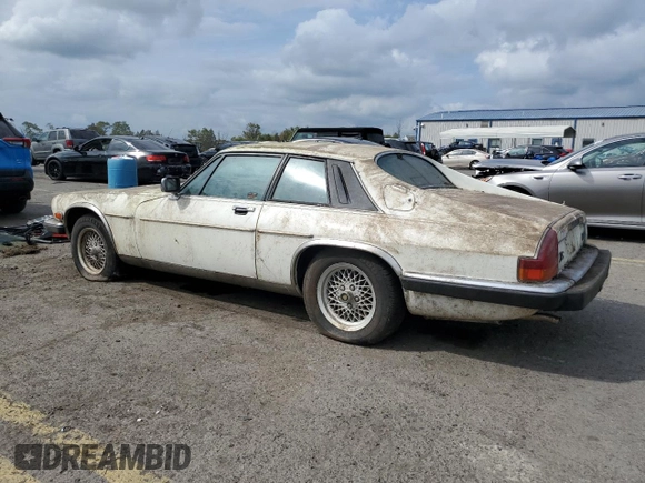 1989 Jaguar XJS z VIN SAJNY584XKC161154, wystawiony jako Copart lot #70912984 z przebiegiem 65 188 mil mil oraz Czysty tytuł • Clean title. Historia ofert i sprzedaży dostępna na DreamBid. Obrazek 2.