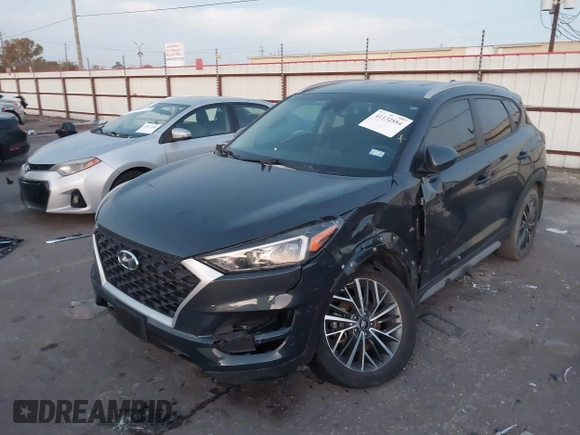 2019 Hyundai Tucson Sport with VIN KM8J33AL7KU901296, listed as a IAAI auction lot 41132884 with 76,948 mi miles. Bid and sale history available at carsss.com. Image 17.