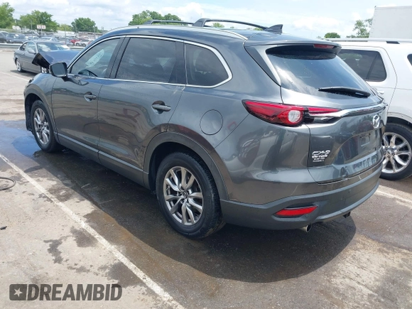 2019 Mazda CX-9 Touring with VIN JM3TCACY6K0334085, listed as a IAAI auction lot 42391595 with 113,723 mi miles and . Bid and sale history available at DreamBid. Image 3.