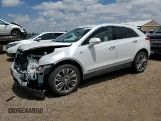 2018 Cadillac XT5 Premium Luxury AWD with VIN 1GYKNFRS4JZ128606, listed as a Copart auction lot 61941695 with 33,511 mi miles and Salvage title. Bid and sale history available at DreamBid. Image 1.