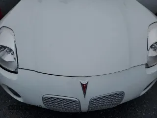 2006 Pontiac Solstice z VIN 1G2MB33B56Y106095, wystawiony jako Copart lot #52068765 z przebiegiem Nie podano mil oraz Szkoda całkowita • Salvage title. Historia ofert i sprzedaży dostępna na DreamBid. Obrazek 11.