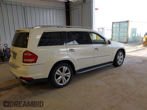 2011 Mercedes-Benz GL-Class GL 450 with VIN 4JGBF7BE9BA645344, listed as a IAAI auction lot 42099508 with 134,244 mi miles. Bid and sale history available at carsss.com. Image 4.