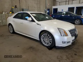 2010 Cadillac CTS Premium with VIN 1G6DS5EV2A0132596, listed as a Copart auction lot 50168765 with 141,161 mi miles and Clean title. Bid and sale history available at DreamBid. Image 4.