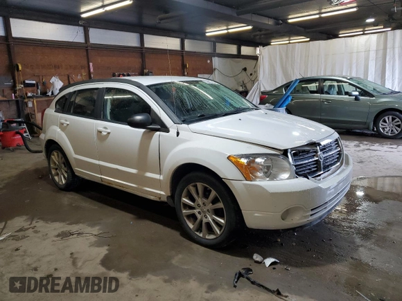 2011 Dodge Caliber Heat z VIN 1B3CB5HA6BD222153, wystawiony jako Copart lot #56881205 z przebiegiem 153 950 mil mil oraz Szkody całkowita. Historia ofert i sprzedaży dostępna na DreamBid. Obrazek 4.