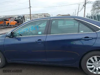 2016 Toyota Camry XLE with VIN 4T1BF1FK9GU600794, listed as a IAAI auction lot 42093868 with 312,083 mi miles. Bid and sale history available at carsss.com. Image 14.