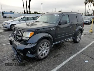 2011 Dodge Nitro Heat with VIN 1D4PT4GX9BW504789, listed as a Copart auction lot 43700585 with 57,944 mi miles and Salvage Title. Bid and sale history available at DreamBid. Image 1.