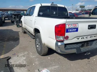 2017 Toyota Tacoma SR5 with VIN 5TFAZ5CN8HX043633, listed as a IAAI auction lot 41520703 with 104,711 mi miles and . Bid and sale history available at DreamBid. Image 3.