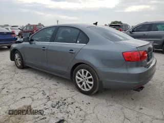 2014 Volkswagen Jetta SE with VIN 3VWD07AJ7EM363186, listed as a Copart auction lot 60873465 with 215,323 mi miles and Salvage title. Bid and sale history available at DreamBid. Image 2.