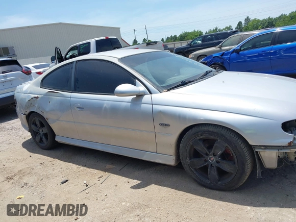 2004 Pontiac GTO z VIN 6G2VX12G04L295369, wystawiony jako IAAI lot #42244826 z przebiegiem Nie podano mil oraz . Historia ofert i sprzedaży dostępna na DreamBid. Obrazek 12.