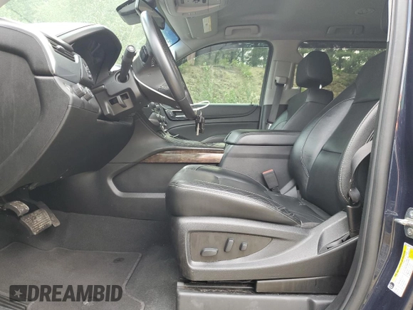 2019 Chevrolet Suburban LT with VIN 1GNSKHKC5KR370813, listed as a Copart auction lot 64362084 with 74,734 mi miles and Salvage Title. Bid and sale history available at DreamBid. Image 7.