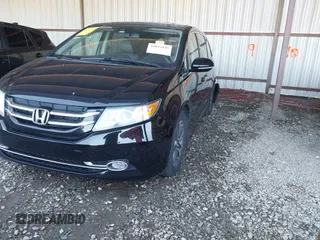 2014 Honda Odyssey Touring with VIN 5FNRL5H94EB110590, listed as a IAAI auction lot 42092929 with 242,338 mi miles and . Bid and sale history available at DreamBid. Image 20.