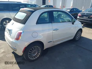 2012 FIAT 500 Lounge z VIN 3C3CFFER7CT119147, wystawiony jako IAAI lot #41431509 z przebiegiem 140 084 mil mil oraz . Historia ofert i sprzedaży dostępna na DreamBid. Obrazek 4.