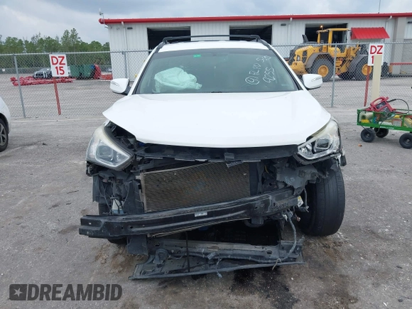 2014 Hyundai Santa Fe with VIN 5XYZU3LB9EG229255, listed as a IAAI auction lot 42407410 with 201,523 mi miles and . Bid and sale history available at DreamBid. Image 13.