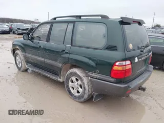 2000 Toyota Land Cruiser with VIN JT3HT05J8Y0084239, listed as a IAAI auction lot 41440548 with 240,000 mi miles. Bid and sale history available at carsss.com. Image 3.