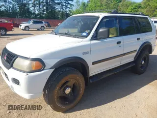 2000 Mitsubishi Montero Sport LS with VIN JA4LS31H2YP814757, listed as a IAAI auction lot 42025459 with 264,548 mi miles. Bid and sale history available at carsss.com. Image 2.