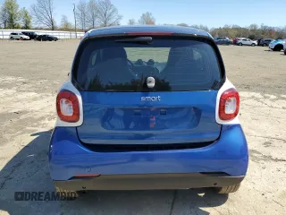 2016 Smart fortwo Passion z VIN WMEFJ5DA6GK064695, wystawiony jako Copart lot #53528315 z przebiegiem 53 508 mil mil oraz Szkody całkowita. Historia ofert i sprzedaży dostępna na DreamBid. Obrazek 6.