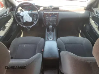 2012 Chevrolet Impala LS Retail with VIN 2G1WA5E3XC1197848, listed as a Copart auction lot 52459095 with 115,945 mi miles and Clean Title. Bid and sale history available at DreamBid. Image 8.