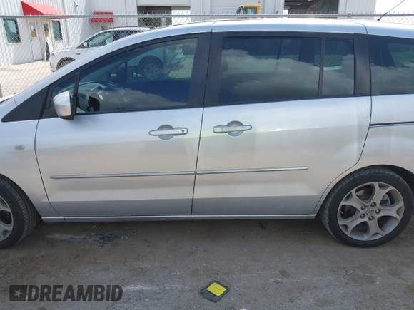 2009 Mazda 5 Sport z VIN JM1CR293090355422, wystawiony jako IAAI lot #42567279 z przebiegiem 214 402 mil mil oraz . Historia ofert i sprzedaży dostępna na DreamBid. Obrazek 14.