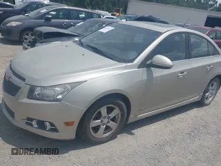 2014 Chevrolet Cruze 1LT with VIN 1G1PC5SB5E7482831, listed as a IAAI auction lot 42438860 with 145,007 mi miles and . Bid and sale history available at DreamBid. Image 2.