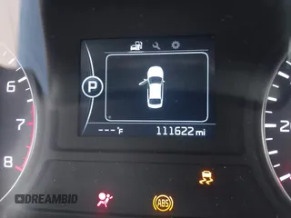 2017 Kia Optima LX z VIN KNAGT4L33H5156094, wystawiony jako IAAI lot #42405505 z przebiegiem 111 622 mil mil oraz . Historia ofert i sprzedaży dostępna na DreamBid. Obrazek 15.