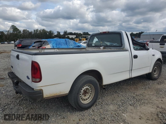 1997 Ford F-150 with VIN 1FTDF17W0VNC92212, listed as a Copart auction lot 74321454 with 242,523 mi miles and Salvage title. Bid and sale history available at DreamBid. Image 3.
