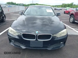 2015 BMW 3 Series 320i with VIN WBA3B1G57FNT05826, listed as a IAAI auction lot 42103193 with 128,800 mi miles. Bid and sale history available at carsss.com. Image 11.