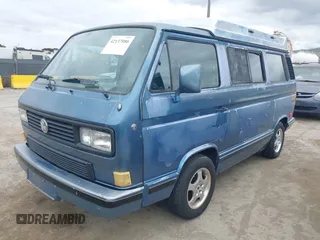 1989 Volkswagen Vanagon with VIN WV2YB0252KH059286, listed as a IAAI auction lot 42137080 with 130,604 mi miles and . Bid and sale history available at DreamBid. Image 2.