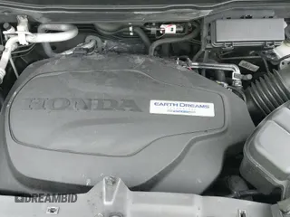 2016 Honda Pilot EX-L with VIN 5FNYF6H89GB005885, listed as a IAAI auction lot 42442688 with 173,204 mi miles and . Bid and sale history available at DreamBid. Image 22.