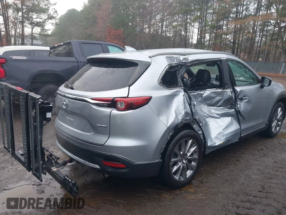 2020 Mazda CX-9 Grand Touring with VIN JM3TCADY4L0405509, listed as a IAAI auction lot 41124952 with 81,786 mi miles. Bid and sale history available at carsss.com. Image 6.