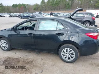 2018 Toyota Corolla L z VIN 2T1BURHEXJC003206, wystawiony jako IAAI lot #42109973 z przebiegiem 90 831 mil mil oraz . Historia ofert i sprzedaży dostępna na DreamBid. Obrazek 14.