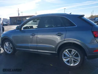 2016 Audi Q3 Premium Plus with VIN WA1BFCFSXGR014778, listed as a IAAI auction lot 41285863 with 73,044 mi miles. Bid and sale history available at carsss.com. Image 14.