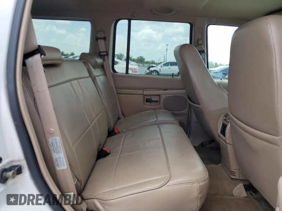 1998 Ford Explorer with VIN 1FMZU32X7WZB87549, listed as a Copart auction lot 60970165 with 186,022 mi miles and Salvage title. Bid and sale history available at DreamBid. Image 10.