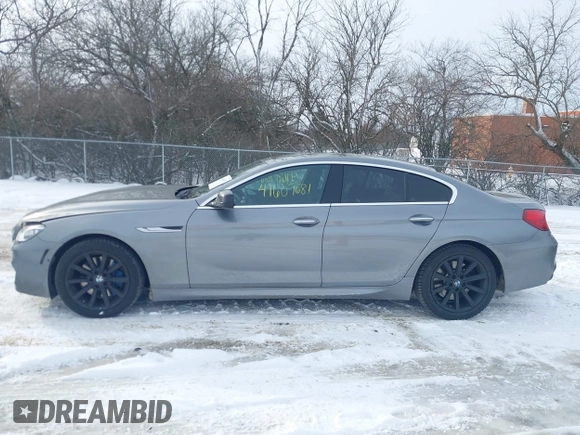 2013 BMW 6 Series 650i xDrive with VIN WBA6B4C54DDG67543, listed as a IAAI auction lot 41607681 with 74,101 mi miles. Bid and sale history available at carsss.com. Image 14.