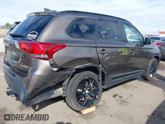 2018 Mitsubishi Outlander SE with VIN JA4AD3A38JZ030633, listed as a IAAI auction lot 41787274 with 70,696 mi miles and . Bid and sale history available at DreamBid. Image 4.