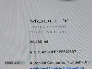 2023 Tesla Model Y Long Range with VIN 7SAYGDEEXPF621397, listed as a IAAI auction lot 41922714 with 29,460 mi miles. Bid and sale history available at carsss.com. Image 15.