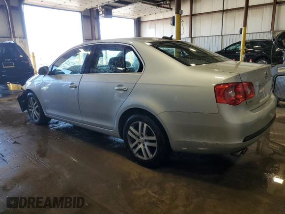 2006 Volkswagen Jetta 2.5L with VIN 3VWSG71K96M646735, listed as a Copart auction lot 52293215 with 64,528 mi miles and Salvage title. Bid and sale history available at DreamBid. Image 2.