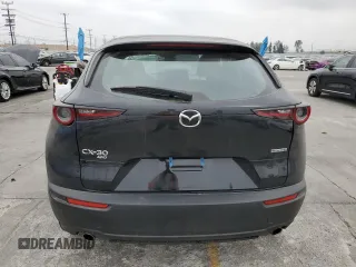 2025 Mazda CX-30 S with VIN 3MVDMBAMXSM778811, listed as a Copart auction lot 54241865 with 8,822 mi miles and Salvage title. Bid and sale history available at DreamBid. Image 6.