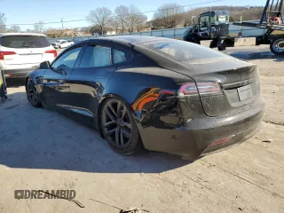 2023 Tesla Model S with VIN 5YJSA1E5XPF519570, listed as a Copart auction lot 80573863 with Not provided miles and Salvage title. Bid and sale history available at DreamBid. Image 2.